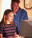 Mother Daughter at Computer Mother Daughter at Computer